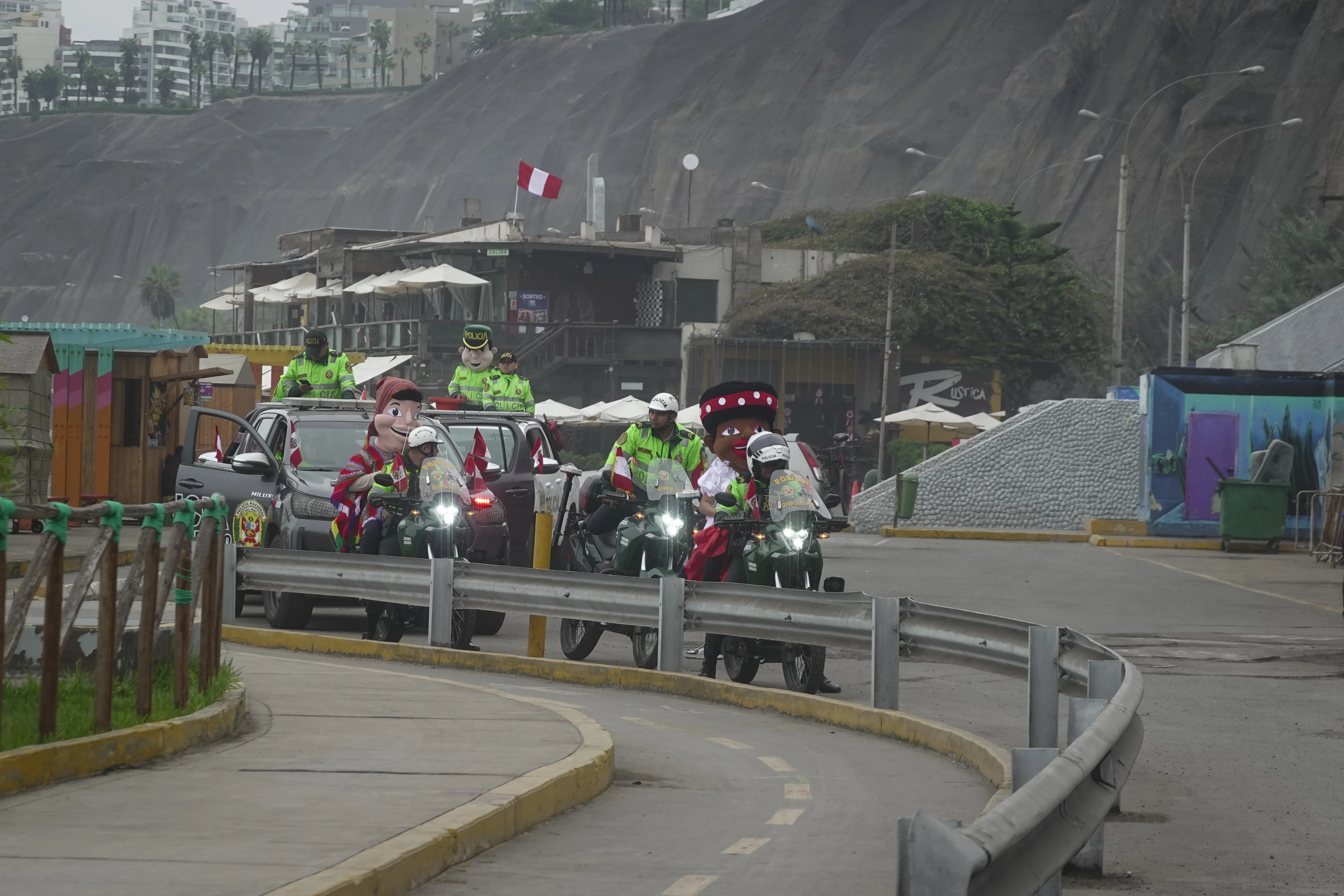 Police people on motor cycles with puppets